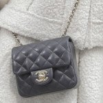 Chanel Extra Mini Classic Flap Bag in black thumb