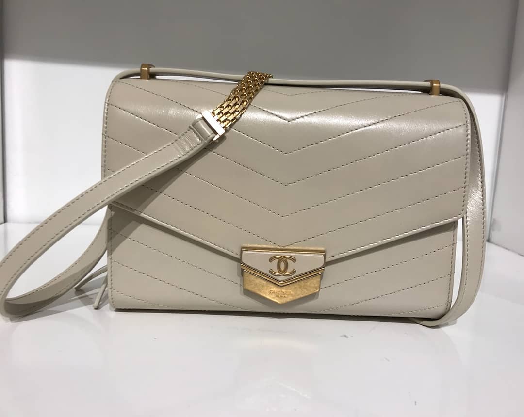 Chanel-chevron-medal-flap-bag-beige