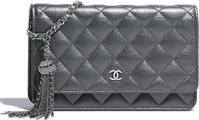 Chanel Classic Quilted WOC With Signature Charm